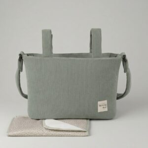 Bolsa canastilla de pana tipo mochila en tono menta de la marca Walking Mum, ideal para paseos urbanos y para el carrito.