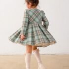Vestido para niña en color anís de la marca Mayoral, ideal para celebraciones y paseos.